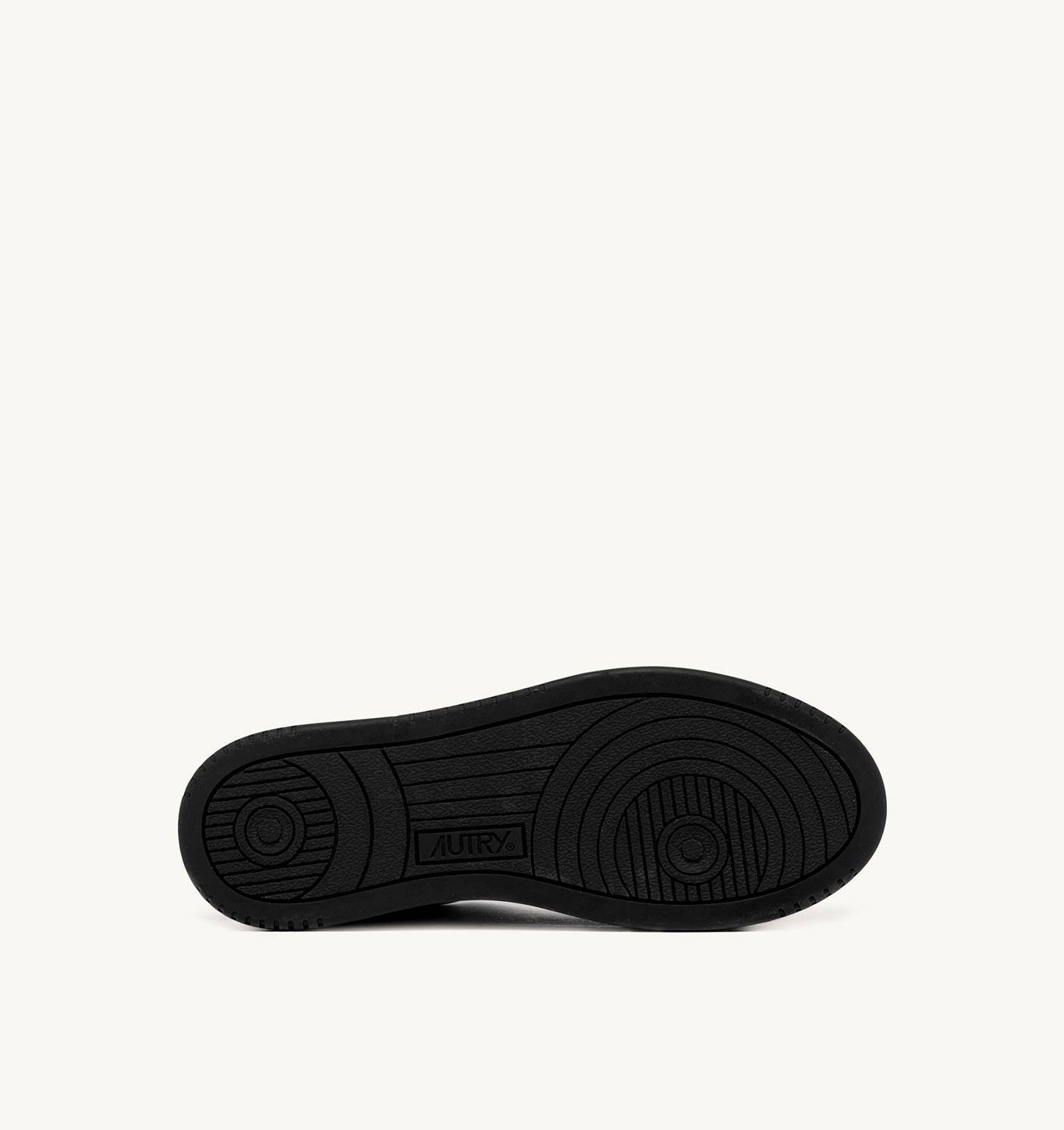 SNEAKERS MEDALIST MULE IN PELLE BIANCA E NERA